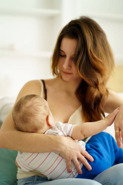 istock young mother breastfeeding her little son 1138137608