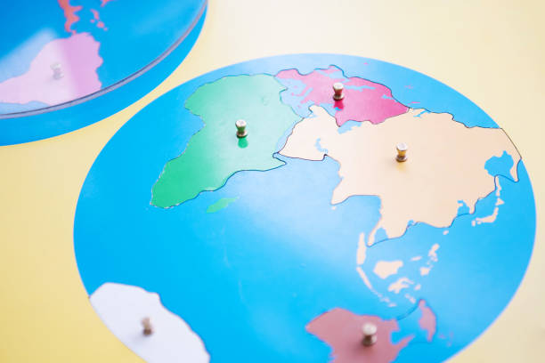 Learning materials in a methodology school. Puzzle with map. stock photo
