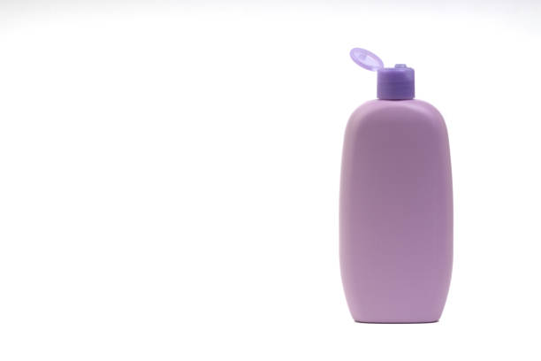 Plastic bottle with shampoo or hygienic cosmetic product, isolated on white