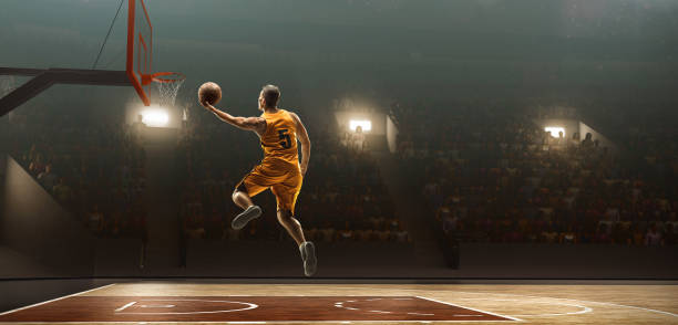 istock Basketball player makes a lay up shot 1138140427