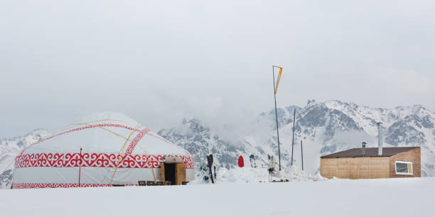 istock yurt standing in the snow with motorcycle in front of it, Mongolia 1138140751