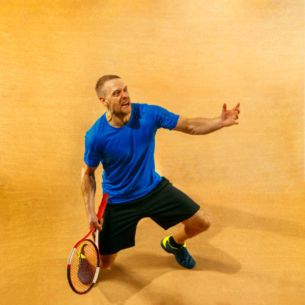 istock Tennis player crouching down looking defeated and sad 1138140933