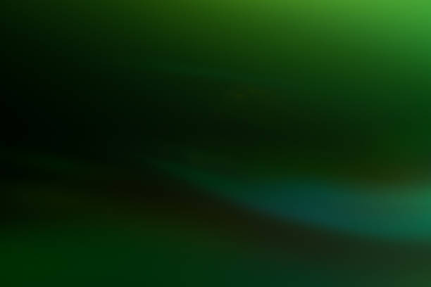 istock bokeh green gradient glow abstract lens flare 1138142608