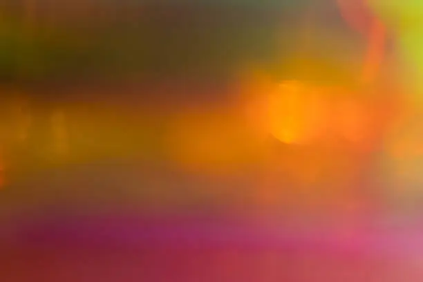 Photo of blur abstract multicolor defocused lens flare glow