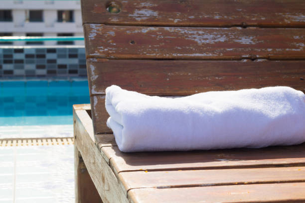 istock Swimming pool towel,wooden 1138144083