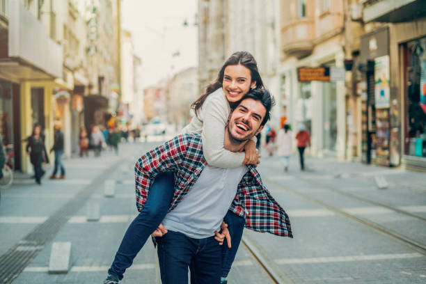 istock Affectionate young couple in the city 1138145411