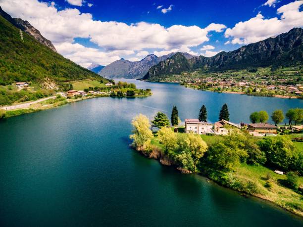 Aerial view of lake Idro near Garda in Italy. Beautiful summer landscape with lake between mountains in Italy. Aerial view of lake Idro near Garda in Italy. Beautiful summer landscape with lake between mountains in rural Italy. como italy stock pictures, royalty-free photos & images