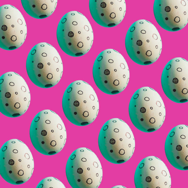 istock Easter eggs with memphis style print on pink bright background. 1138148005