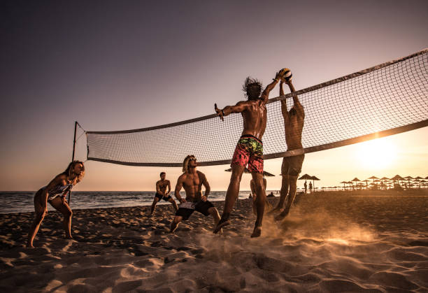 istock Volleyball blocking on the beach at sunset! 1138150964