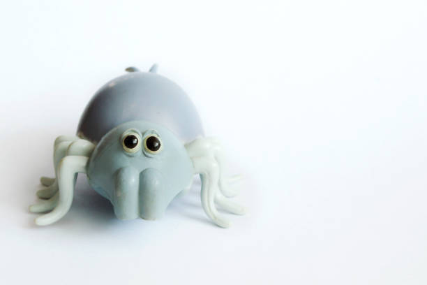 istock toy baby spider on a white background 1138153252