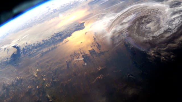 Earth surface seen from space. Northern lights and hurricane. NASA Public Domain Imagery