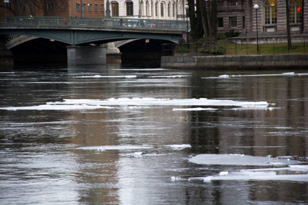 istock Ice is melting on the river.Melting ice on the river. 1138154165