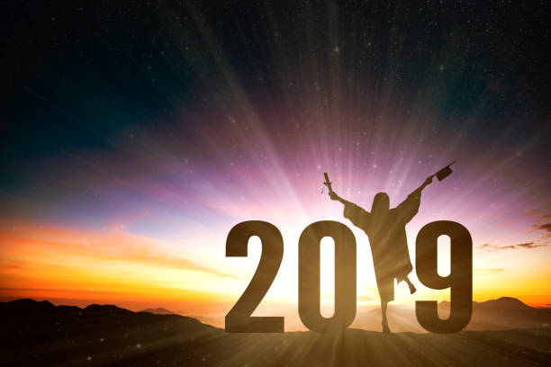 istock successful female graduation with 2019  year concept 1138154374