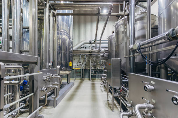 istock Industrial stainless steel vats in modern brewery 1138154714