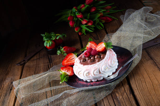 istock light pavlova with fresh fruits and chocolate 1138154904