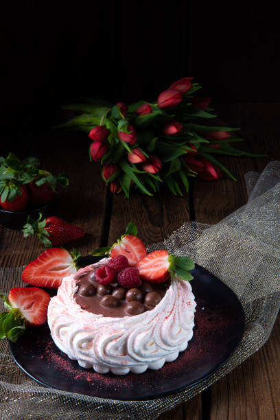 istock light pavlova with fresh fruits and chocolate 1138154972
