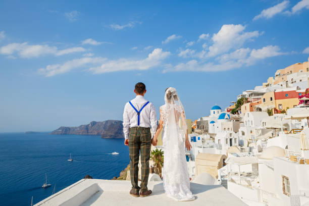 istock Beautiful wedding couple e on Santorini island 1138155067