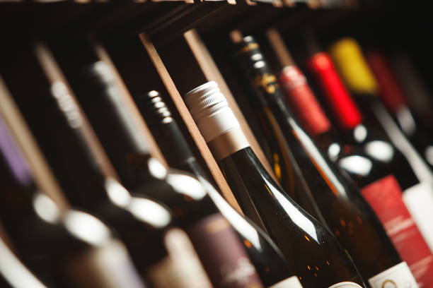 istock Wine cellar with elite drinks on shelves with written names 1138158457