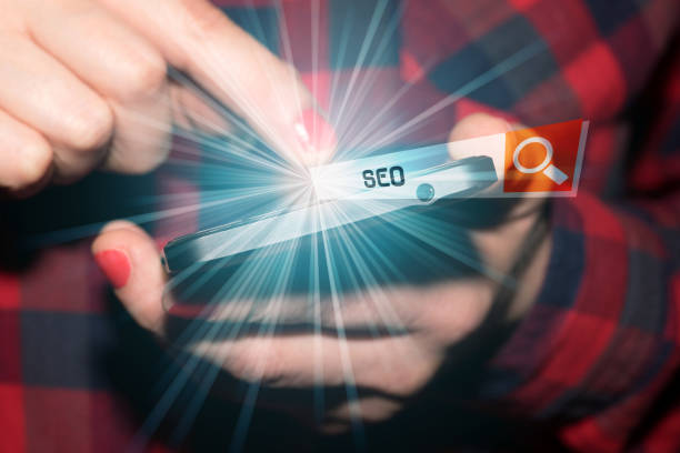 istock A Woman on Her smartphone informs HERSELF about SEO Search Engine Optimization 1138159248