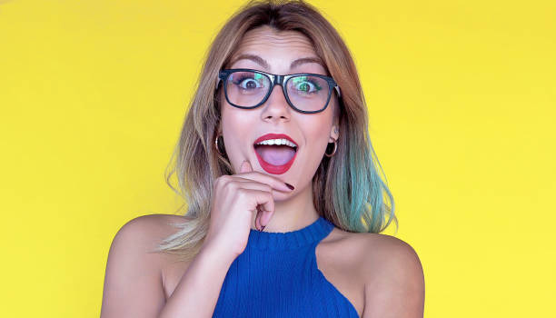 istock Smiling woman posing in glasses 1138160010
