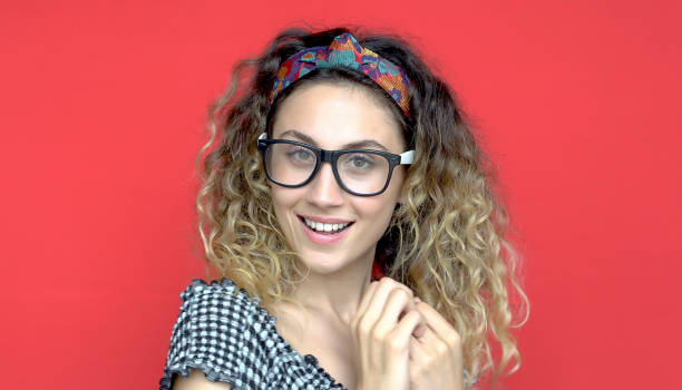 istock Smiling woman posing in glasses 1138160012