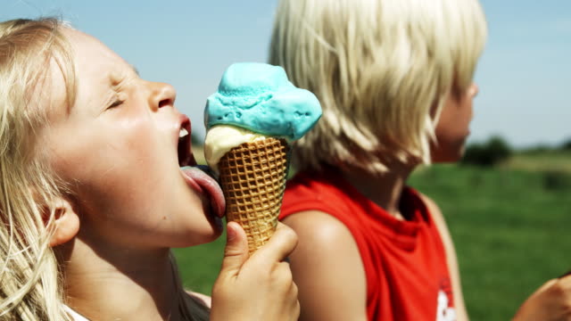 Kids eating Ice Cream (SHot on Red)