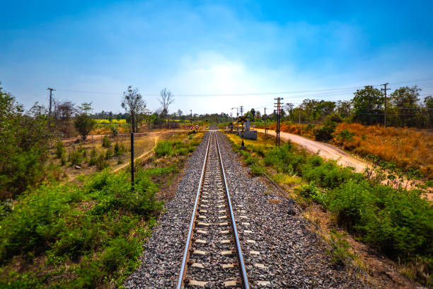 istock Railway train on hills on blue sky in country 1138163461