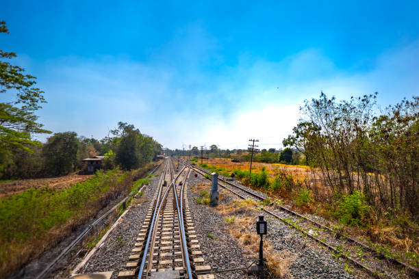 istock Railway train on hills on blue sky in country 1138163500