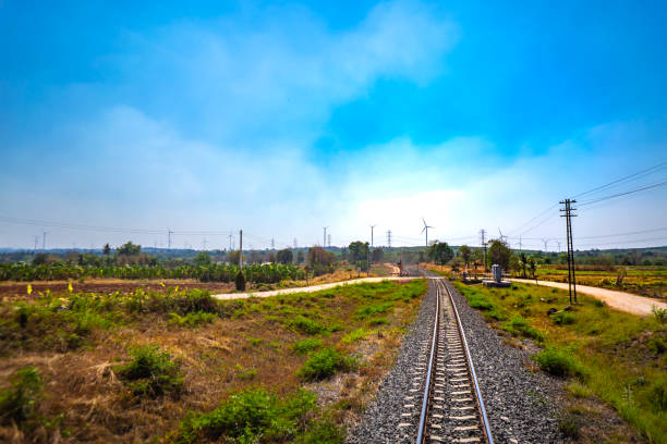 istock Railway train on hills on blue sky in country 1138163585