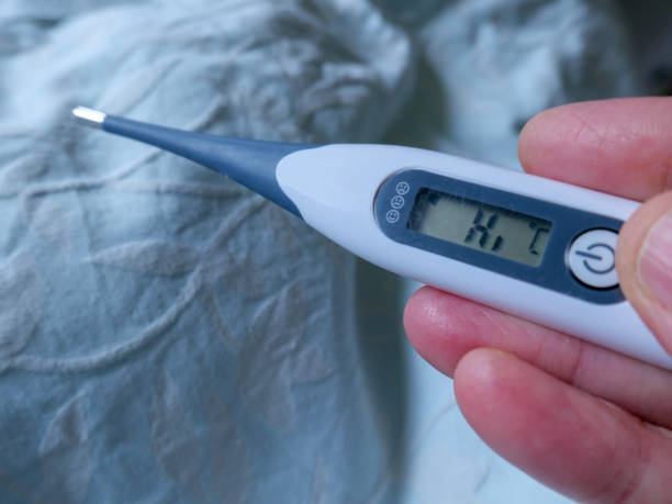 istock Sick at home with high temperature 1138163993
