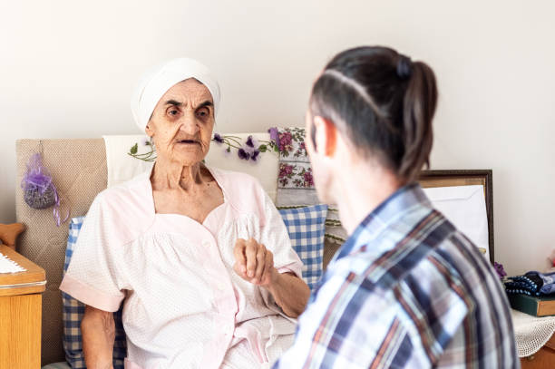 istock Very old senior woman having a conversation with her grandson 1138164326
