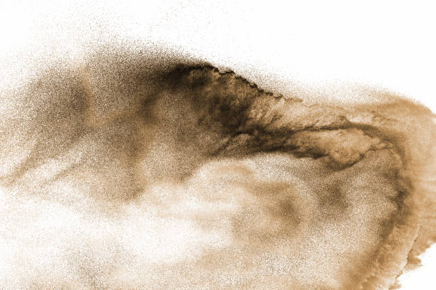 istock Brown dry river sand explosion isolated on white background. Abstract sand splashing. 1138172135