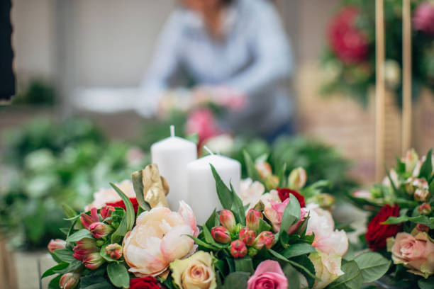 istock Beautiful arranged flowers and candles 1138172792