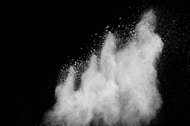 istock White powder explosion.Freeze motion of white dust particles on black background. 1138173085