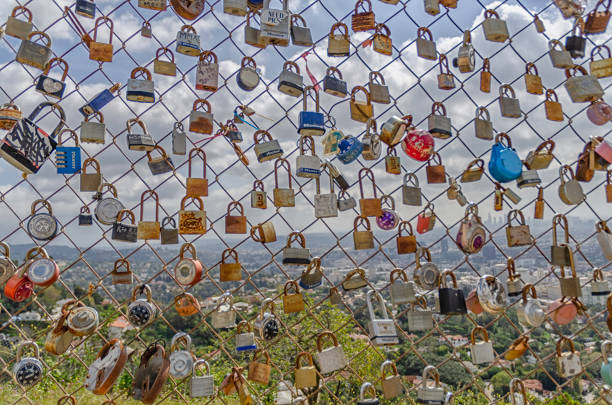 Love locks on Runyon Canyon fence, Los Angeles, CA.
