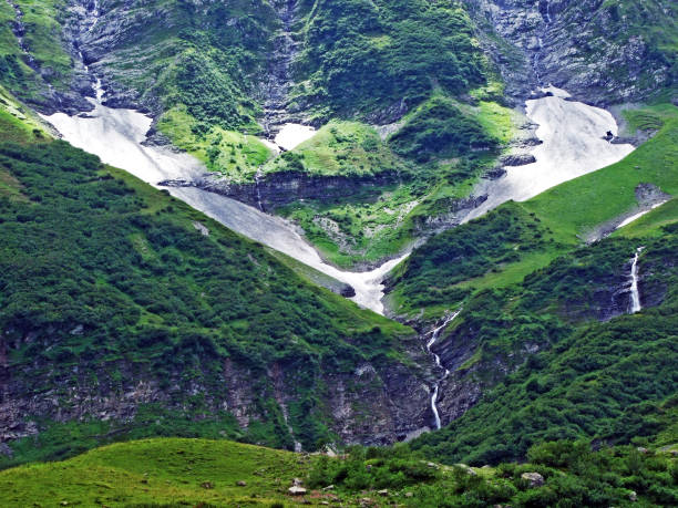 istock Waterfalls on the Mitteleggbach stream in the Wichlen Alpine Valley 1138179864