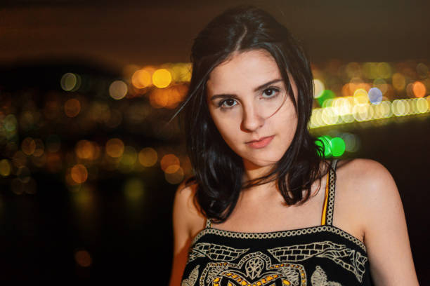 istock Young woman portrait at night 1138184078