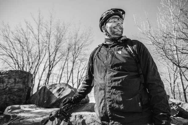 portrait of caucasian man biking - ontario spring bicycle city life imagens e fotografias de stock