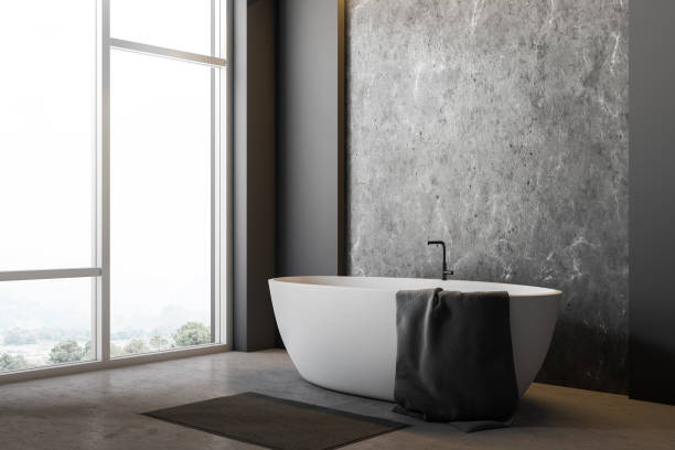 istock Gray bathroom corner with tub 1138188772