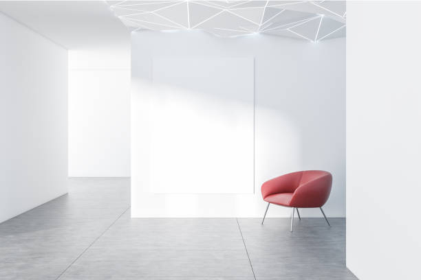 istock Empty white corridor with armchair and poster 1138189749