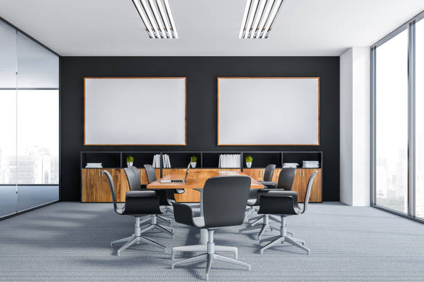 istock Black meeting room with two posters 1138190091