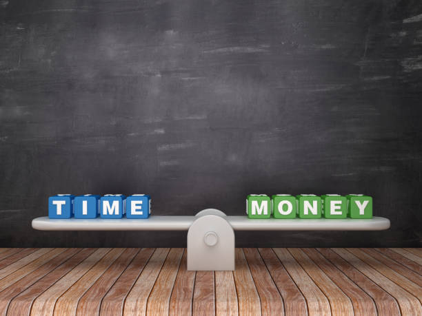 istock Seesaw Scale with TIME MONEY Cubes on Chalkboard Background - 3D Rendering 1138194124