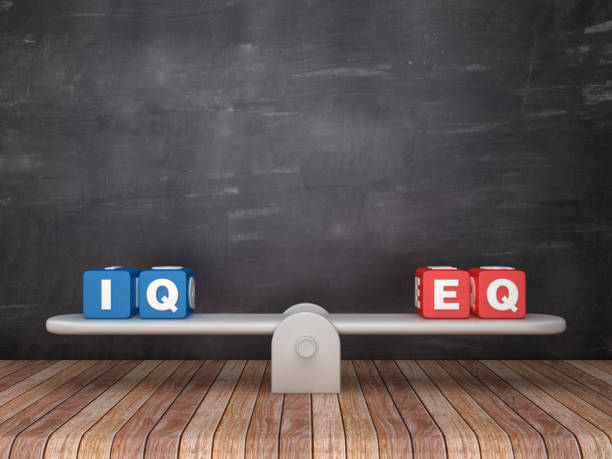 istock Seesaw Scale with IQ EQ Cubes on Chalkboard Background - 3D Rendering 1138194176