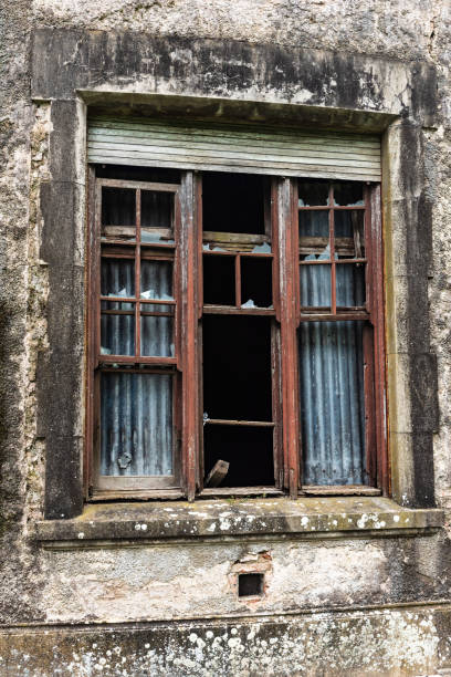 istock Window of an old abandoned house that caught fire 1138196053
