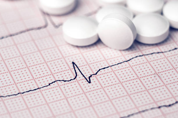 istock ecg cardiogram and pills 1138199053