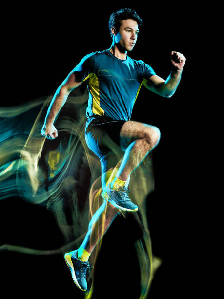 istock runner running jogger jogging man isolated light painting black background 1138199389