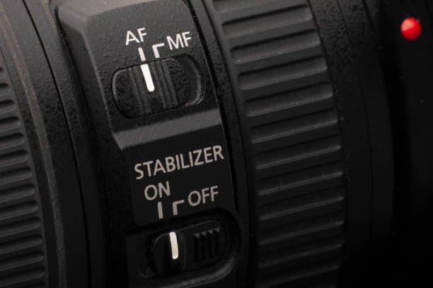 istock Close up view of a DSLR camera in dark atmosphere 1138201382