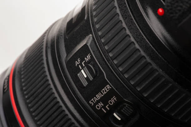 istock Close up view of a DSLR camera in dark atmosphere 1138201466