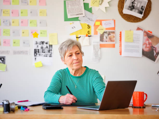 istock Freelance Senior Woman Working at Home 1138201783
