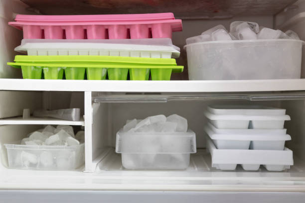 istock Full of ice cubes in freezer get ready for summer. 1138201814